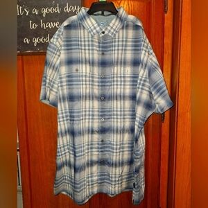 A Kuhl Men's Blue Plaid Short Sleeve Button-down Shirt in a size large. EUC